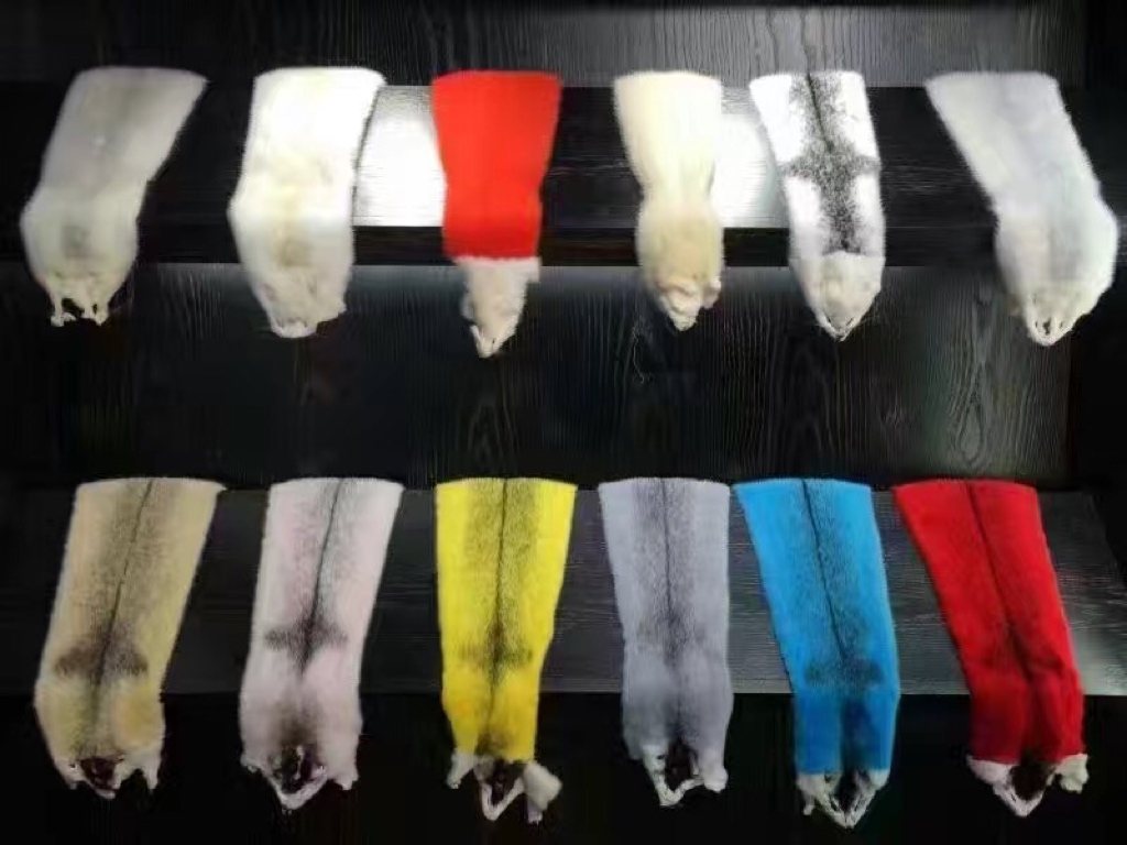 Individual dyed fur colour samples including yellow, blue and red